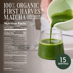 A hand pours bright green matcha tea from a white pitcher into a clear glass, with large text reading '100% Organic First Harvest Matcha Zero Sugar Zero Additives' and a nutrition facts panel on the left. A dark green circle says '15 Servings'. _30g (1.06oz) 15 cups