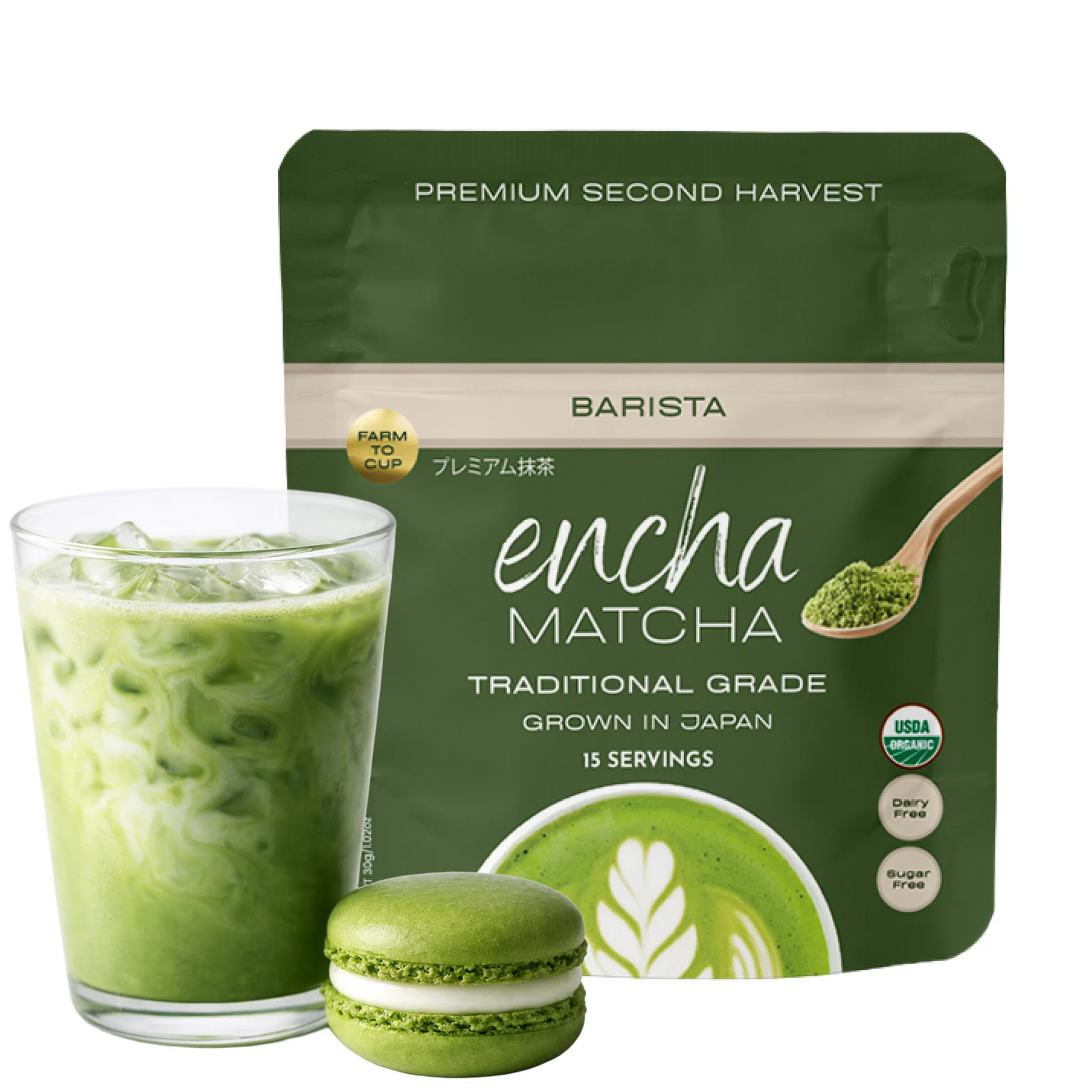 A pouch of Encha Matcha Traditional Grade matcha powder by Barista, shown alongside a glass of iced matcha latte and a matcha-filled macaron on a white background. _30g (1.06 oz) 15 cups