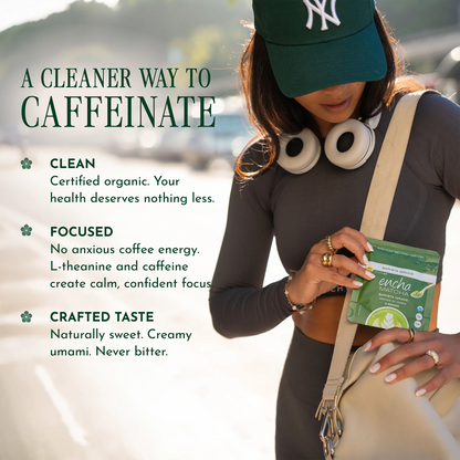 A woman wearing a green New York Yankees cap, dark gray long-sleeve top, and beige shoulder bag holds a green Encha coffee pouch. The image features marketing text on the left: 'A CLEANER WAY TO CAFFEINATE' with bullet points for 'CLEAN', 'FOCUSED', and 'CRAFTED TASTE'.