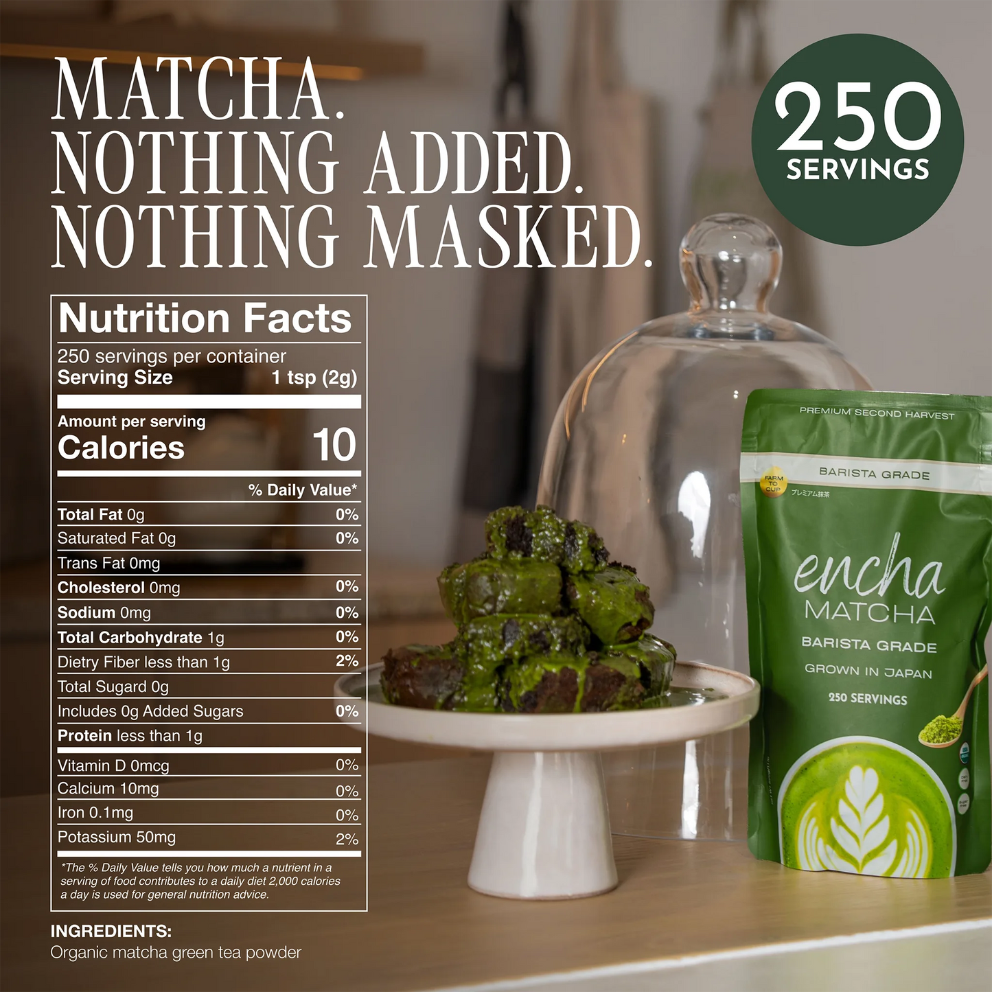 A green pouch of Encha Matcha Barista Grade matcha green tea powder is shown next to a glass cloche holding green tea-dusted desserts on a white pedestal, with a Nutrition Facts label and a dark green '250 Servings' badge overlaid on a warm indoor background. __500g (17.64oz) 250 cups